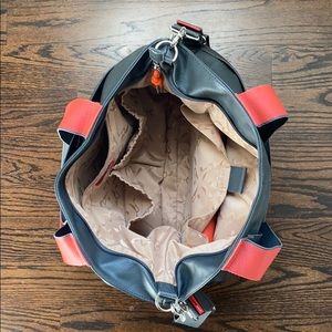 Gray/orange storksac diaper bag